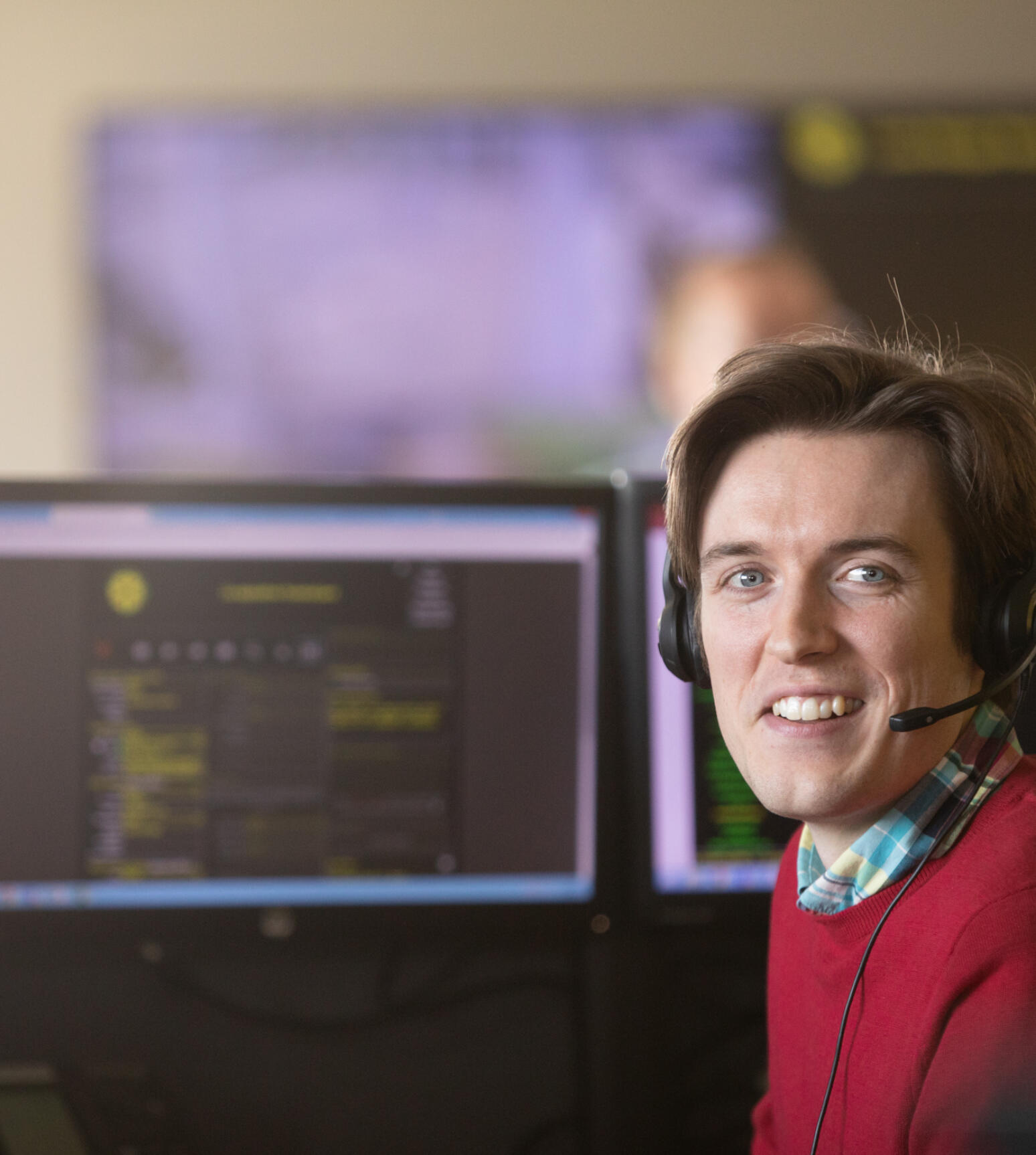 alt="Lemon Contact Centre operator wearing headset"