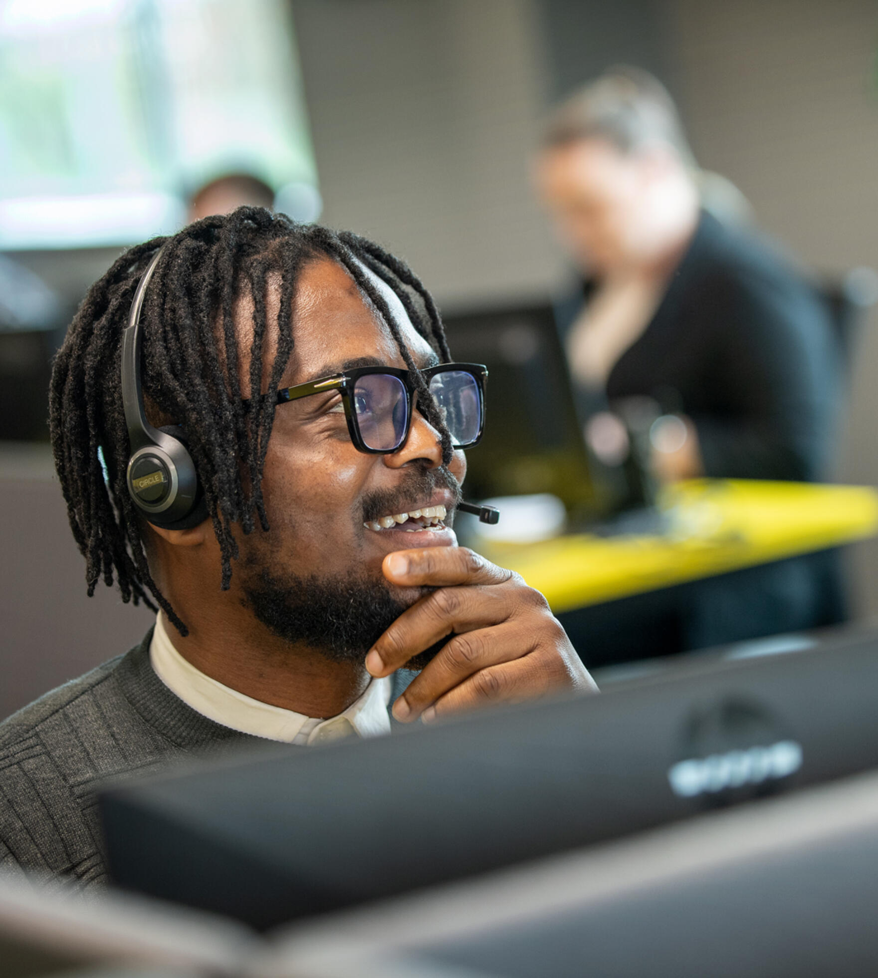 alt=Lemon Contact Centre operator wearing headset"