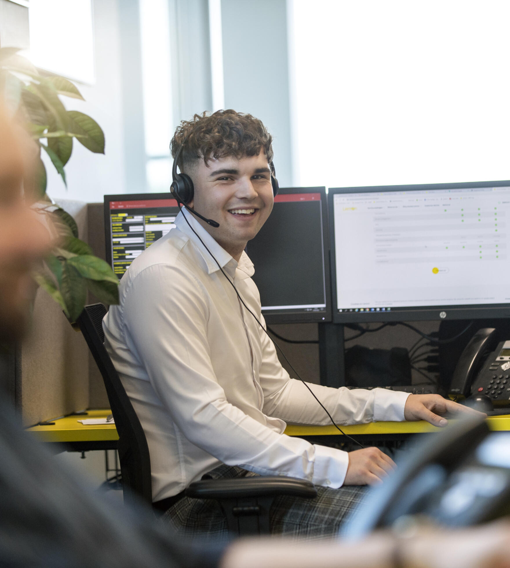 alt="male contact centre operators at Lemon Contact Centre"