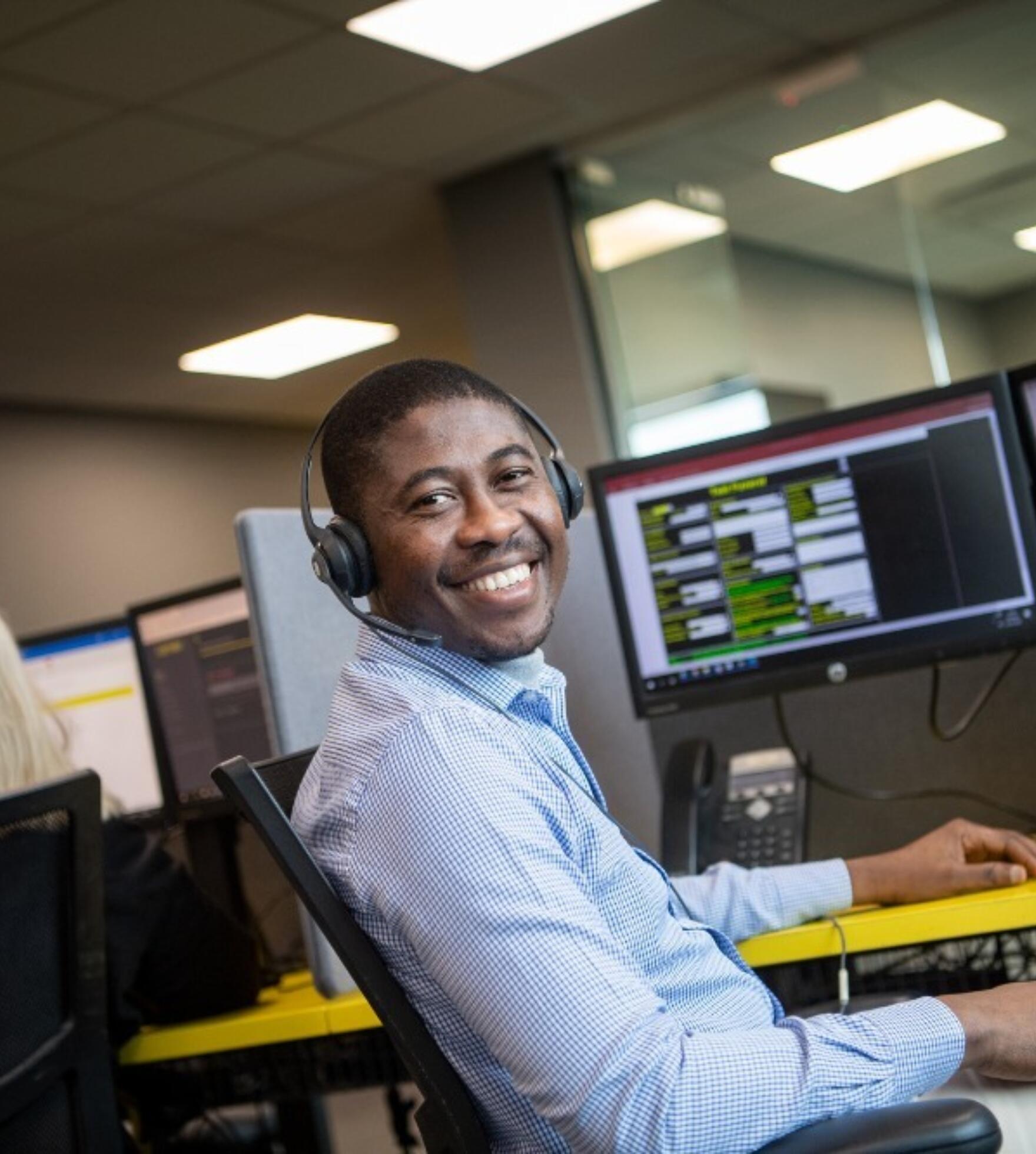 alt="Lemon Contact Centre operator smiling"