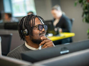 alt="Lemon Contact Centre operator wearing headet"