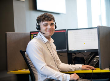 alt="Lemon Contact Centre male operator wearing headset"