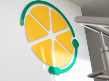 alt="Lemon Contact Centre logo on white wall"