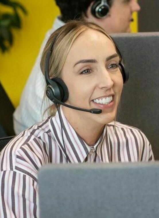 alt="Lemon Contact Centre operator wearing headset"