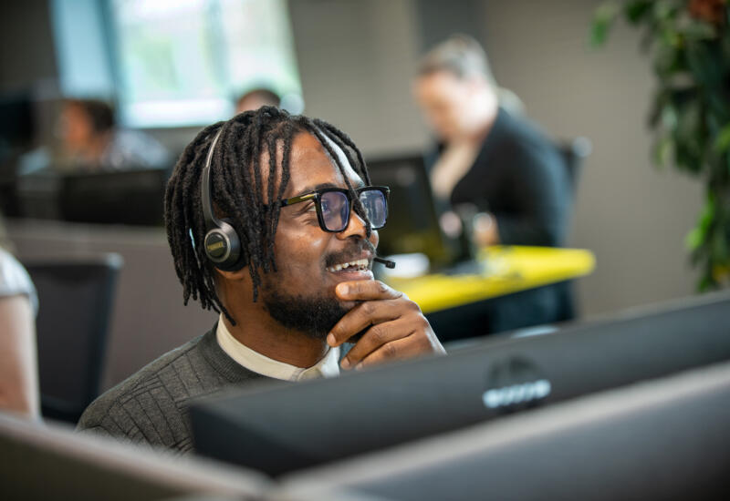 alt=Lemon Contact Centre operator wearing headset"