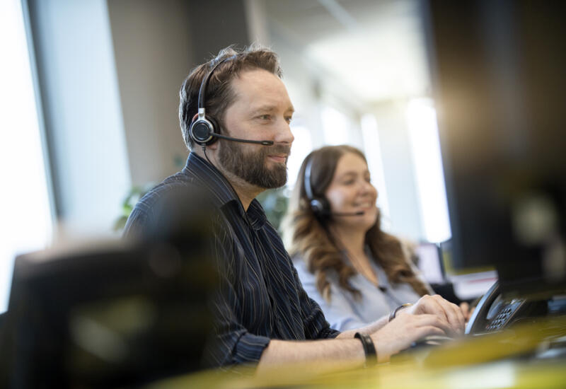 alt="Lemon Contact Centre operators wearing headsets speaking to clients"